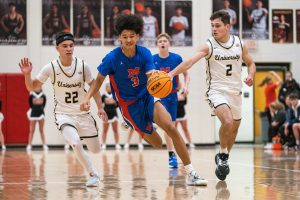 Mohigans pull away from rival Hawks, 65-45